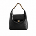 Chanel Maxi Caviar Quilted Fold-Over Hobo